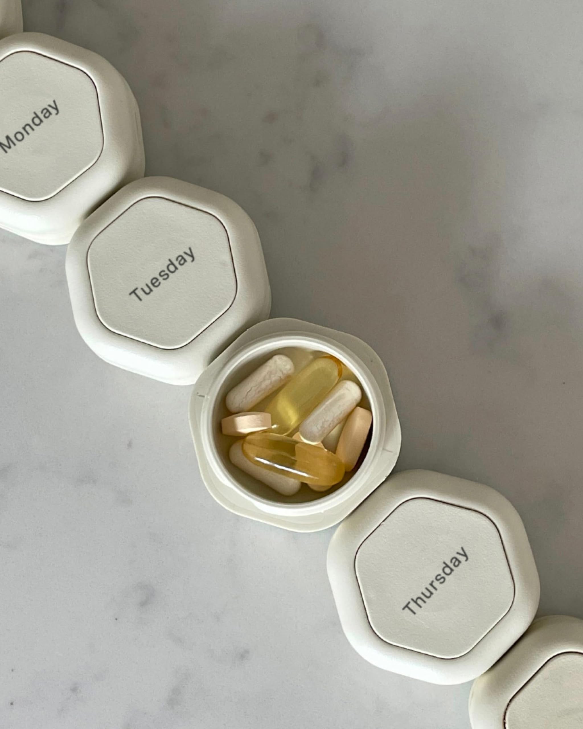 10-cadence-travel-containers-pill-case-set-magnetic-travel-capsules-a-daily-pill-box-for-supplements-vitamins-contains-7-flex-smalls-0-56oz-with-labels-for-everyday-of-the-week-sand-1.jpg